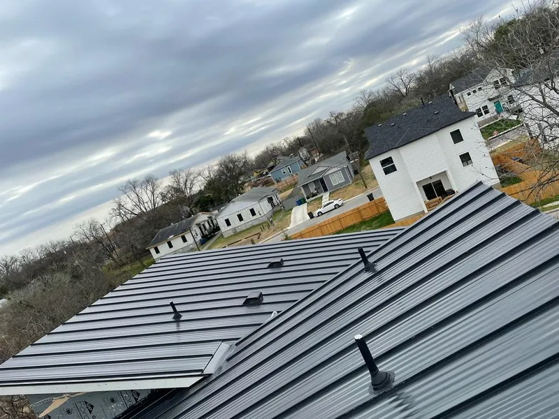 Standing seam metal roof panels with vents for Skylight Repair in Farragut